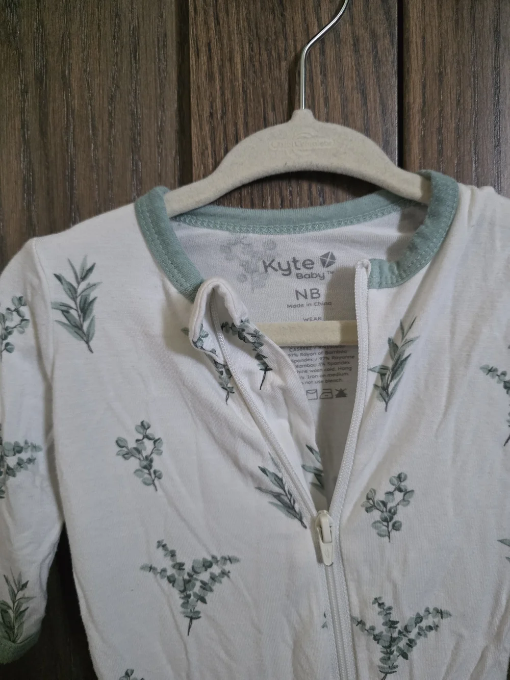 Kyte Cream Footed Zip One-Piece with Green Leaf Print